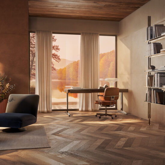Ambiente moderno con pavimento in gres porcellanato effetto legno, tonalità calde e texture materica.